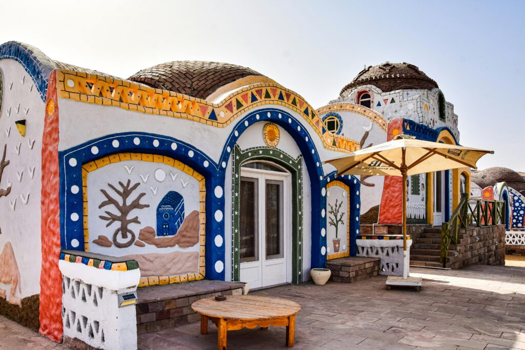 Vibrant Nubian village house with artistic decorations in Egypt.