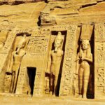 Detailed carvings on the Abu Simbel temple showcasing ancient Egyptian artistry.